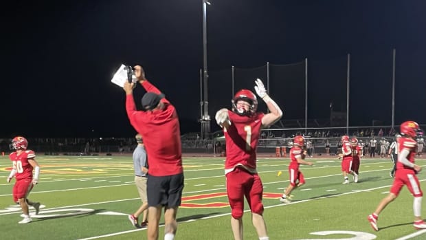 Chico coach high fives player justin couchot photo